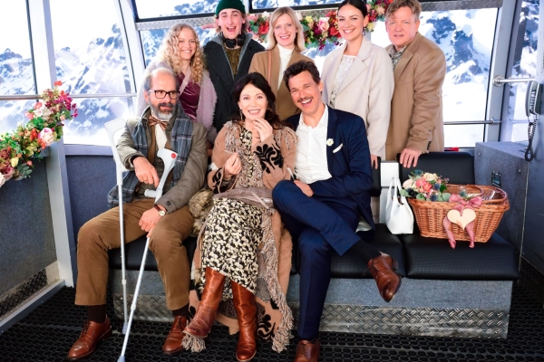 Bild: Die Familie in einer Gondel der Seilbahn.