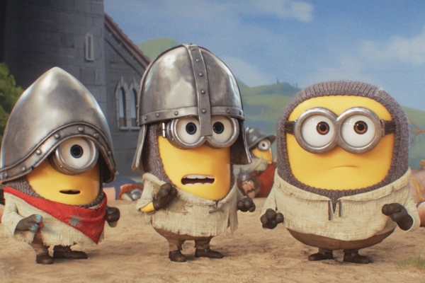 Bild: Drei Minions stehen m Vordergrund. Sie sind angezogen wie Ritter.